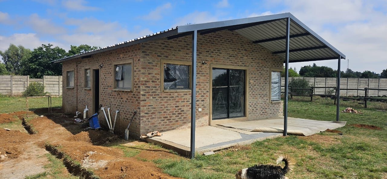 Brick home exterior with carport
